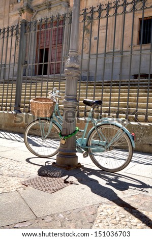 Bike parked in front of the stairs of College of the Immaculate Conception, commonly called, Calatrava College, Salamanca