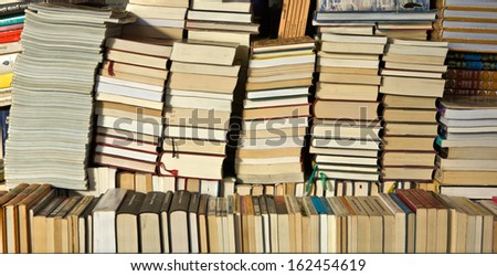 Rows of second hand books for sale at outdoor market