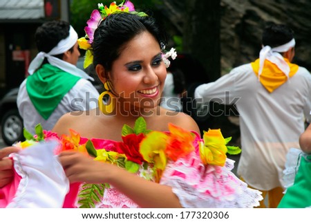 NEW YORK - JUN 22: Native latin woman participates in a dance parade, on June  22, 2008 in New York City, USA