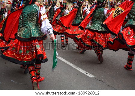 Performers dressed up with russian folk costumes take part in the Carnival parade of comparsas at Badajoz City, Spain