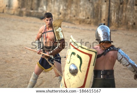 MERIDA, SPAIN, APRIL 5: performing of gladiators fighting of Merida\'s Amphitheater on April 05, 2014 in Merida, Spain. The show recreates a gladiator??s fight