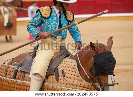 BADAJOZ, SPAIN, JUNE 21: The lancer is waiting for their turn close to bulllfighters, on June 21, 2014 in Badajoz, Spain