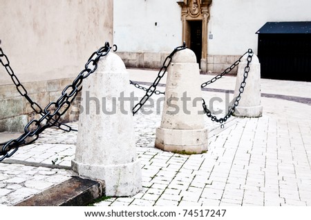 stone barricade with chain