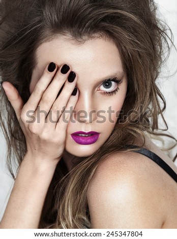 sexy girl covered her face half hand isolated with beauty pink lipstick. high fashion portrait