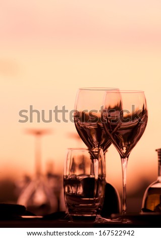 Romantic Glasses set in a romantic restaurant setting