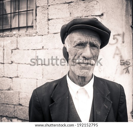 BESNI, TURKEY - 2014 MAY: Unidentified old man\'s portrait on the street