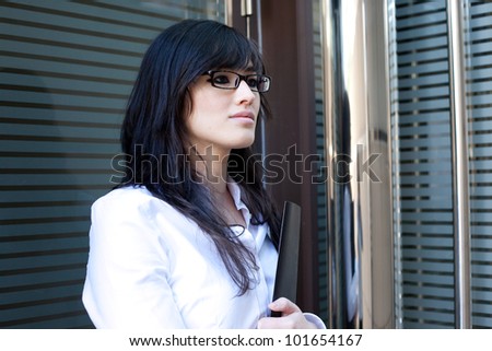 Young beautiful asian woman holding a folder