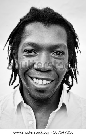 Close up portrait of a Jamaican man. Black and white.