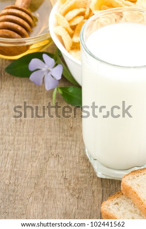 milk products isolated on wood background