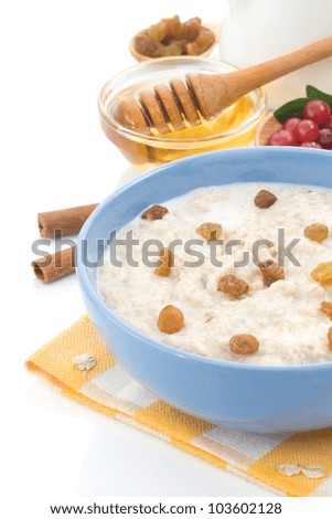 oatmeal and milk isolated on white background