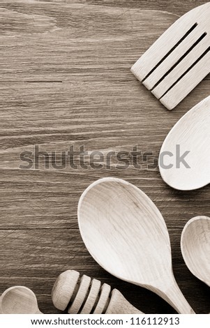 wood utensils on wooden background texture