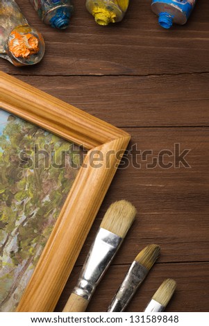 brush and painting  on wood background
