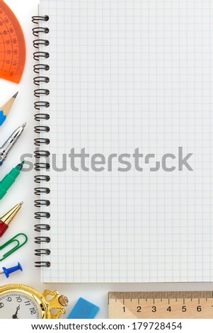notebook and office accessories isolated on white background