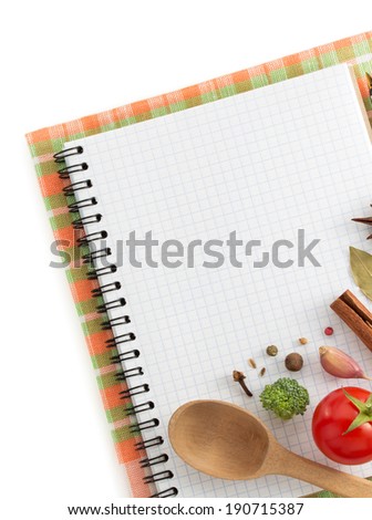 spices and recipe book on white background