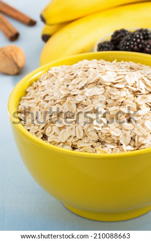 bowl of oat flake on tablecloth background
