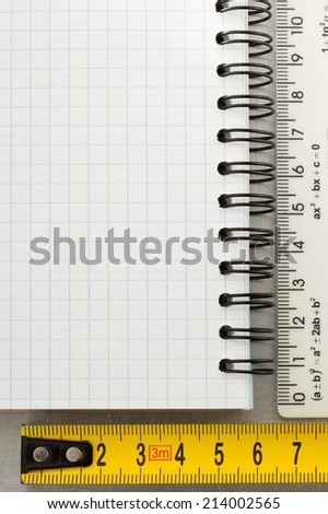 checked note paper at metal background texture