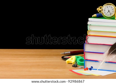 back to school supplies isolated on black background texture