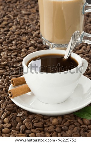 cup of coffee and beans isolated on white background