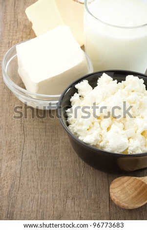 milk products on wood background texture
