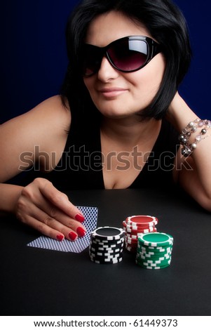 Beautiful Woman Playin Poker in Casino
