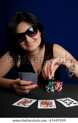 Beautiful Woman Playin Poker in Casino