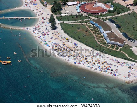 Paradise beach with people aerial view