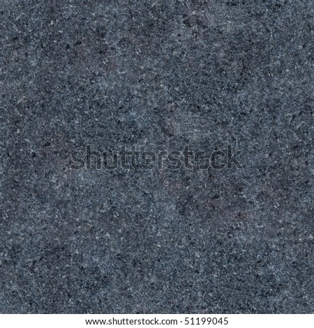 Seamless dark grey granite texture. Close-up photo
