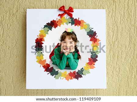 Autumn card with circle of colorful paper leaves