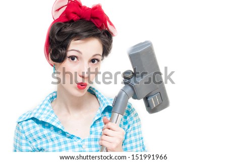 Pinup woman and vacuum cleaner