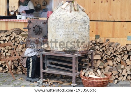 picture of bakers prepare old-style traditional bread on food market fair or exhibition