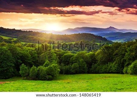 Majestic sunset in the mountains landscape. Overcast sky before storm. Carpathian, Ukraine, Europe. Beauty world.