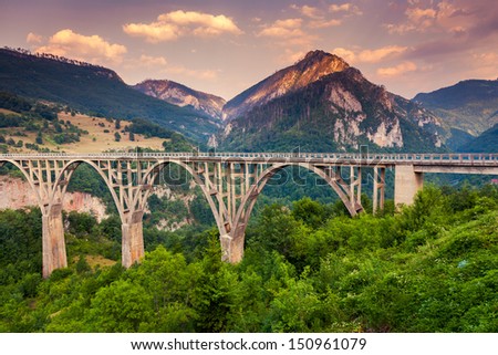 Old big bridge in Durdevica and fantastic view Tara river gorge - is the biggest one canyon in Europe in the national park Durmitor, Montenegro. Balkans. Beauty world.