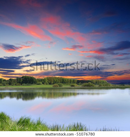 Beautiful morning landscape with the lake