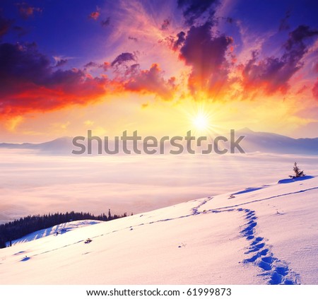 majestic sunset in the winter mountains landscape. HDR image