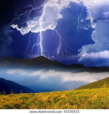 Thunderstorm with lightning in mountain landscape