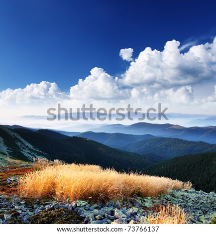 Beautiful mountains landscape and cloudy sky