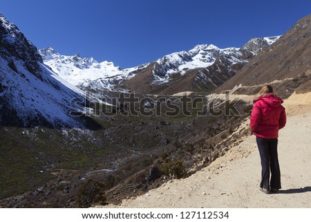 Tsopta Valley, Sikkim - India. Woman enjoying the view.