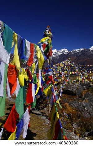 Prayer flags at th top of Yangrima peak. Helembu region Nepal