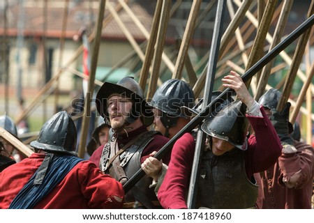 CHIPPENHAM, UK - JULY 7: English Civil War Society members re-enact the Battle of Chippenham that took place in the summer of 1643 on July 7, 2013 in Chippenham, UK.