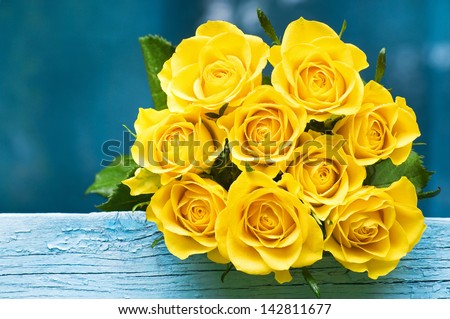 Yellow Roses Bouquet On The Blue Wood