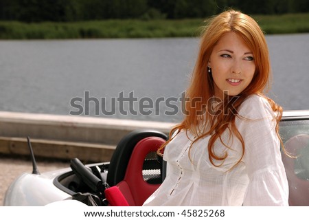 Woman and white sport-car