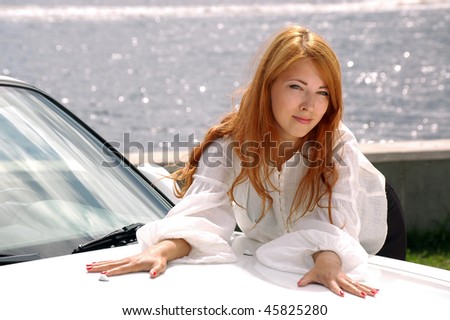 Woman and white sport-car