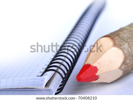 Background with note pad and pencil
