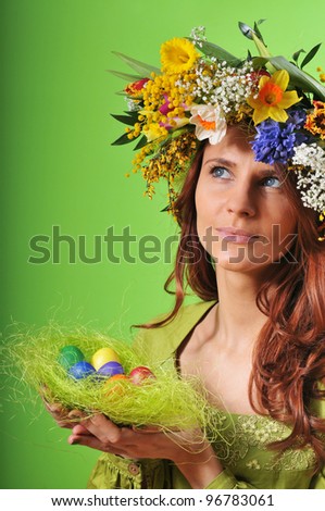 Spring woman with nest