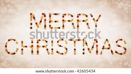Season\'s Greetings made of Christmas baubles on background with ice crystals and snow flakes