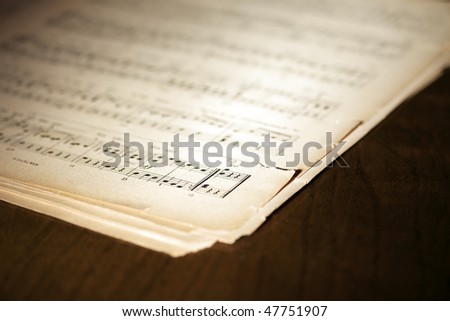 Closeup of torn and yellowed music book