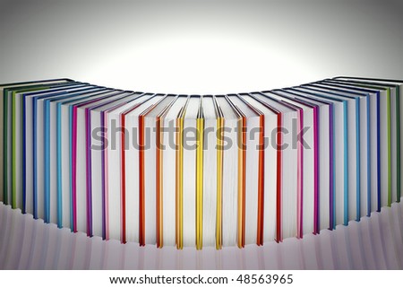 Symmetrical curve alignment of in rainbow colors paper wrapped books with spine facing away and reflection, view from front-top, PHOTOGRAPH, NOT 3D RENDER.