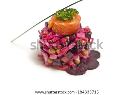 appetizing salad appetizer of beet and salmon isolated on white background