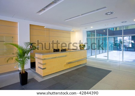 Lobby entrance with reception desk  in a business center building