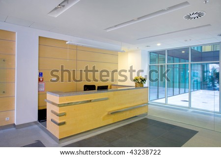 Lobby entrance with reception desk  in a business center building